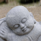 Laying child garden sculpture jizo bosatsu