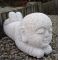 Laying child garden sculpture jizo bosatsu